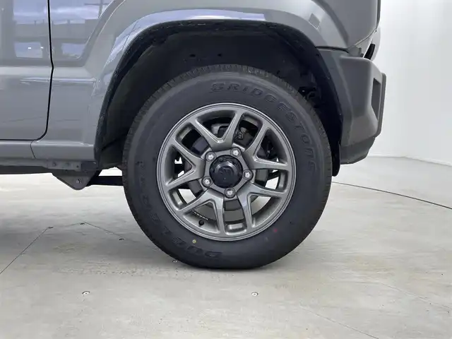 スズキ ジムニー XC 福井県 2023(令5)年 1.4万km ミディアムグレー 4WD/スズキセーフティサポート/ロッソモデロマフラー/社外フューエルリッド/IPFフォグランプ/クルーズコントロール/社外メモリナビ/-フルセグTVCD/DVD/Bluetooth/バックカメラ/ドライブレコーダー/ドアバイザー/フロアマット/前席シートヒーター/純正１６インチAW/プッシュスタート/スマートキー