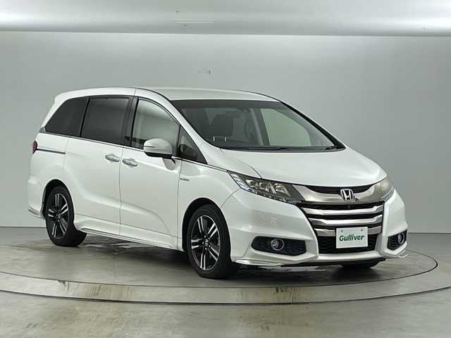 ホンダ オデッセイ ハイブリッド アブソルートセンシングEXパック 愛知県 2016(平28)年 8.8万km ホワイトオーキッドパール 禁煙車/メーカー7インチナビ/（CD/ＤＶＤ/フルセグTV/Bluetooth/ＡＭ/ＦＭ/HDMI）/全方位カメラ/ホンダセンシング/・レーダークルーズコントロール/・衝突軽減ブレーキ/・レーンキープアシスト/・ブラインドスポットモニター/ＥＴＣ/合皮/ファブリックコンビシート/パワーシート/オットマン/両側パワーバックドア/純正１７インチアルミホイール/スマートキー/スペアキー1本/プッシュスタート/ＬＥＤヘッドライト/オートライト/フロントフォグランプ/純正フロアマット