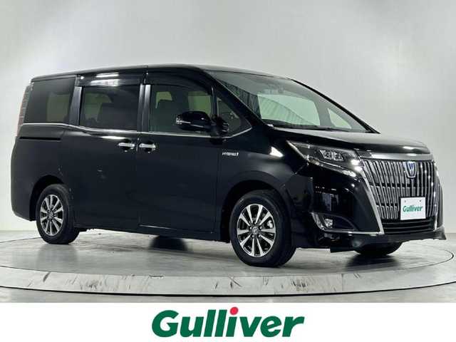 トヨタ エスクァイア ハイブリッド Gi 佐賀県 2019(令1)年 3.4万km ブラック ディーラー純正ワイドナビ/フルセグTV/Bluetooth/FM/AM/バックカメラ/合皮シート/シートヒーター/Wオートエアコン/両側パワースライドドア/ビルトインETC/コーナーセンサー/メーカーオプションサウンドスピーカー/革巻きステアリング/トヨタセーフティセンス/PCS・２DA/オートマチックハイビーム/クルーズコントロール