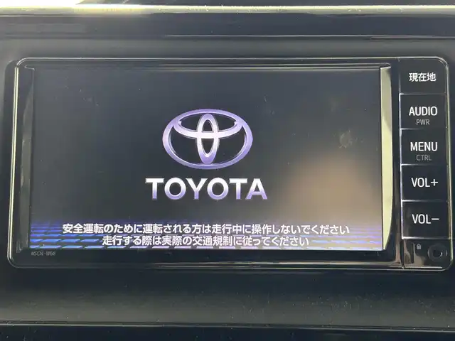 トヨタ エスクァイア ハイブリッド Gi 佐賀県 2019(令1)年 3.4万km ブラック ディーラー純正ワイドナビ/フルセグTV/Bluetooth/FM/AM/バックカメラ/合皮シート/シートヒーター/Wオートエアコン/両側パワースライドドア/ビルトインETC/コーナーセンサー/メーカーオプションサウンドスピーカー/革巻きステアリング/トヨタセーフティセンス/PCS・２DA/オートマチックハイビーム/クルーズコントロール