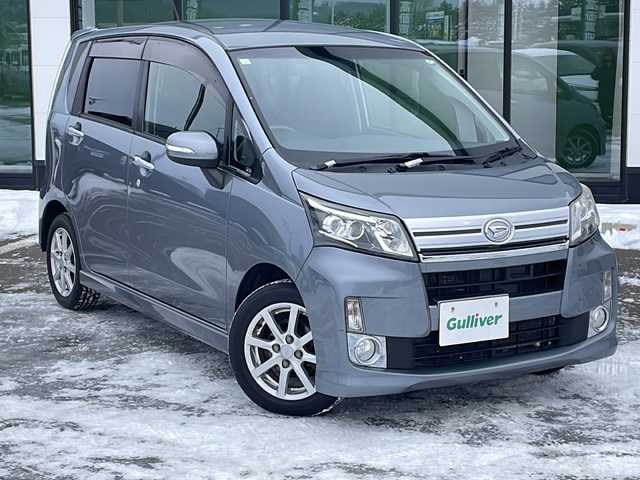 ダイハツ ムーヴ カスタム X SA 道東・釧路十勝 2013(平25)年 10.4万km リキッドシルバーM ・４WD/・社外HDDナビ/（HDD CD DVD MD)/・衝突被害軽減システム/・横滑り防止装置/・アイドリングストップ/・ETC/・電動格納ミラー/・ウィンカーミラー/・プッシュスタート/・スマートキー/・純正フロアマット/・純正ドアバイザー/・純正14インチアルミホイール/・LEDヘッドライト/・ハロゲンフォグライト/・オートライト/・取扱説明書