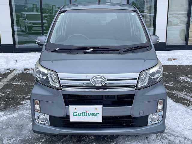 ダイハツ ムーヴ カスタム X SA 道東・釧路十勝 2013(平25)年 10.4万km リキッドシルバーM ・４WD/・社外HDDナビ/（HDD CD DVD MD)/・衝突被害軽減システム/・横滑り防止装置/・アイドリングストップ/・ETC/・電動格納ミラー/・ウィンカーミラー/・プッシュスタート/・スマートキー/・純正フロアマット/・純正ドアバイザー/・純正14インチアルミホイール/・LEDヘッドライト/・ハロゲンフォグライト/・オートライト/・取扱説明書