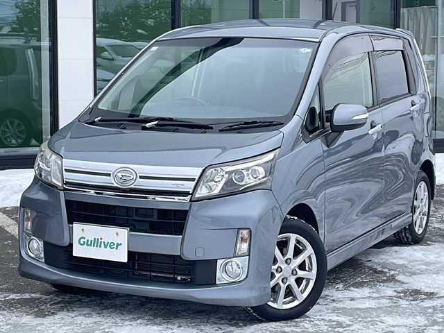 ダイハツ ムーヴ カスタム X SA 道東・釧路十勝 2013(平25)年 10.4万km リキッドシルバーM ・４WD/・社外HDDナビ/（HDD CD DVD MD)/・衝突被害軽減システム/・横滑り防止装置/・アイドリングストップ/・ETC/・電動格納ミラー/・ウィンカーミラー/・プッシュスタート/・スマートキー/・純正フロアマット/・純正ドアバイザー/・純正14インチアルミホイール/・LEDヘッドライト/・ハロゲンフォグライト/・オートライト/・取扱説明書