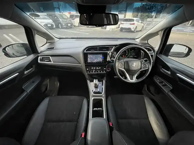 ホンダ シャトル ハイブリッド X ホンダセンシング 愛知県 2019(令1)年 3.1万km クリスタルブラックパール Gathersナビ（フルセグ、CD、DVD、AM、FM、BT）/バックカメラ/プッシュスタート/レーダークルーズコントロール/パドルシフト/ビルトインETC/ステアリングリモコン/ハーフレザーシート/シートヒーター（DN）/オートライト/電格ウィンカーミラー/横滑り防止/衝突軽減システム/路外逸脱抑制システム/スペアキー/取扱説明書/ナビ取扱説明書/保証書