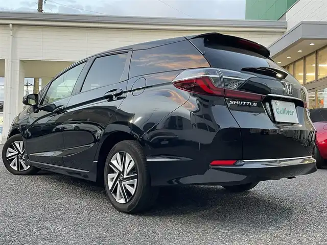 ホンダ シャトル ハイブリッド X ホンダセンシング 愛知県 2019(令1)年 3.1万km クリスタルブラックパール Gathersナビ（フルセグ、CD、DVD、AM、FM、BT）/バックカメラ/プッシュスタート/レーダークルーズコントロール/パドルシフト/ビルトインETC/ステアリングリモコン/ハーフレザーシート/シートヒーター（DN）/オートライト/電格ウィンカーミラー/横滑り防止/衝突軽減システム/路外逸脱抑制システム/スペアキー/取扱説明書/ナビ取扱説明書/保証書