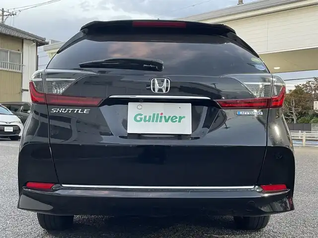 ホンダ シャトル ハイブリッド X ホンダセンシング 愛知県 2019(令1)年 3.1万km クリスタルブラックパール Gathersナビ（フルセグ、CD、DVD、AM、FM、BT）/バックカメラ/プッシュスタート/レーダークルーズコントロール/パドルシフト/ビルトインETC/ステアリングリモコン/ハーフレザーシート/シートヒーター（DN）/オートライト/電格ウィンカーミラー/横滑り防止/衝突軽減システム/路外逸脱抑制システム/スペアキー/取扱説明書/ナビ取扱説明書/保証書