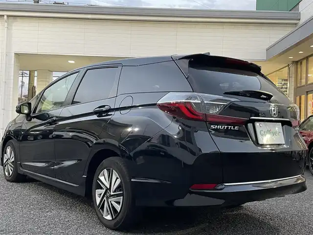 ホンダ シャトル ハイブリッド X ホンダセンシング 愛知県 2019(令1)年 3.1万km クリスタルブラックパール Gathersナビ（フルセグ、CD、DVD、AM、FM、BT）/バックカメラ/プッシュスタート/レーダークルーズコントロール/パドルシフト/ビルトインETC/ステアリングリモコン/ハーフレザーシート/シートヒーター（DN）/オートライト/電格ウィンカーミラー/横滑り防止/衝突軽減システム/路外逸脱抑制システム/スペアキー/取扱説明書/ナビ取扱説明書/保証書