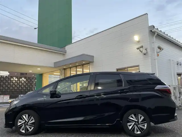 ホンダ シャトル ハイブリッド X ホンダセンシング 愛知県 2019(令1)年 3.1万km クリスタルブラックパール Gathersナビ（フルセグ、CD、DVD、AM、FM、BT）/バックカメラ/プッシュスタート/レーダークルーズコントロール/パドルシフト/ビルトインETC/ステアリングリモコン/ハーフレザーシート/シートヒーター（DN）/オートライト/電格ウィンカーミラー/横滑り防止/衝突軽減システム/路外逸脱抑制システム/スペアキー/取扱説明書/ナビ取扱説明書/保証書