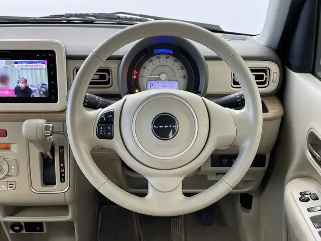 スズキ ラパン X 新潟県 2015(平27)年 2.6万km シフォンアイボリーメタリック 禁煙車/登録時走行距離：25786km/メーカーオプション純正ナビ/CD/フルセグTV/Bluetooth/AUX/全方位カメラ/バックカメラ/前後ドライブレコーダー/ETC/衝突被害軽減システム/横滑り防止装置/HIDヘッドライト/運転席シートヒーター/エンジンスタートボタン/スマートキー/純正フロアマット/純正14インチアルミホイール