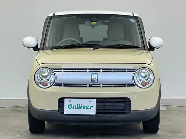 スズキ ラパン X 新潟県 2015(平27)年 2.6万km シフォンアイボリーメタリック 禁煙車/登録時走行距離：25786km/メーカーオプション純正ナビ/CD/フルセグTV/Bluetooth/AUX/全方位カメラ/バックカメラ/前後ドライブレコーダー/ETC/衝突被害軽減システム/横滑り防止装置/HIDヘッドライト/運転席シートヒーター/エンジンスタートボタン/スマートキー/純正フロアマット/純正14インチアルミホイール