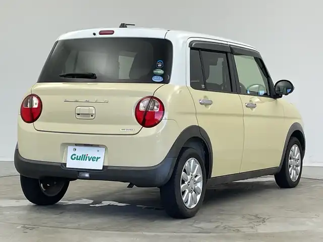 スズキ ラパン X 新潟県 2015(平27)年 2.6万km シフォンアイボリーメタリック 禁煙車/登録時走行距離：25786km/メーカーオプション純正ナビ/CD/フルセグTV/Bluetooth/AUX/全方位カメラ/バックカメラ/前後ドライブレコーダー/ETC/衝突被害軽減システム/横滑り防止装置/HIDヘッドライト/運転席シートヒーター/エンジンスタートボタン/スマートキー/純正フロアマット/純正14インチアルミホイール