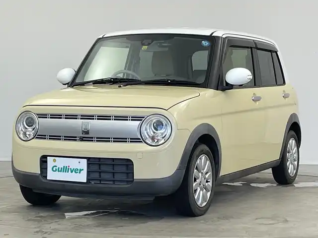 スズキ ラパン X 新潟県 2015(平27)年 2.6万km シフォンアイボリーメタリック 禁煙車/登録時走行距離：25786km/メーカーオプション純正ナビ/CD/フルセグTV/Bluetooth/AUX/全方位カメラ/バックカメラ/前後ドライブレコーダー/ETC/衝突被害軽減システム/横滑り防止装置/HIDヘッドライト/運転席シートヒーター/エンジンスタートボタン/スマートキー/純正フロアマット/純正14インチアルミホイール