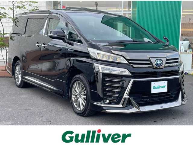 トヨタ ヴェルファイア ハイブリット Z ゴールデンアイズ 青森県 2020(令2)年 7.4万km ブラック 4WD/ワンオーナー/純正DAナビ・フルセグTV/CD・DVD・Bluetooth・USB/後席純正フリップダウンモニター/ツインムーンルーフ/デジタルインナーミラー/合皮コンビシート/両側パワースライドドア/パワーバックドア/セーフティセンス/プリクラッシュセーフティ/レーダークルーズコントロール/レーントレーシングアシスト/アダプティブハイビーム/前後ドライブレコーダー/ビルトインETC2.0/AC100V100W電源/3眼LEDヘッドライト/LEDフォグランプ/純正17インチアルミ/モデリスタエアロ