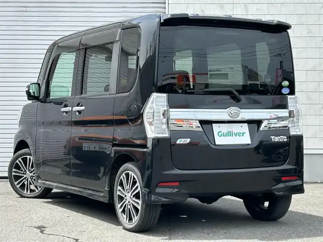 ダイハツ タント カスタム RS SA 道東・釧路十勝 2014(平26)年 6.8万km ブラックマイカメタリック 4WD/純正ナビ/(FM AM CD DVD BT フルセグTV)/バックカメラ/両側パワースライドドア/衝突軽減ブレーキ/AW付冬タイヤ4本積込/プッシュスタート/スマートキー/LEDヘッドライト/フォグランプ/ETC/USBソケット/取扱説明書/革巻きステアリング/ドアバイザー