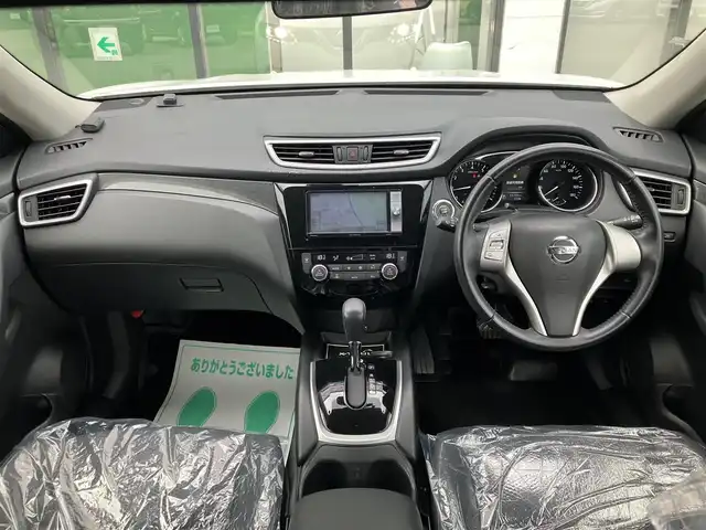 日産 エクストレイル 20X エマージェンシーブレーキ 道南・函館 2015(平27)年 5.5万km ブリリアントホワイトパール ・7人乗り/・社外ＳＤナビ（ＣＤ、ＤＶＤ、ＢＴ）/・フルセグＴＶ/・フリップダウンモニター/・バックカメラ/・衝突軽減ブレーキ/・ブラインドスポットモニター/・前後コーナーセンサー/・電動リアゲート/・前席シートヒーター/・社外ＡＷ/・ルーフレール/・NISMOスポーツサスペンション/・ETC