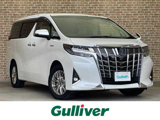 トヨタ アルファードハイブリット G 岩手県 2020(令2)年 6.6万km ホワイトパールクリスタルシャイン ４WD/三眼LEDヘッドランプ/シーケンシャルウインカー/パワーバックドア/両側パワースライドドア/AC100V1500Wアクセサリーコンセント/パワーシート・シートヒーター・シートベンチレーション（前席）/トヨタセーフティセンス/プリクラッシュセーフティ/レーダークルーズコントロール/レーントレーシングアシスト/アダプティブハイビームシステム/クリアランスソナー/ロードサインアシスト/オートブレーキホールド/横滑り防止装置/MTモード付きAT/ロールサンシェード/カーテン/純正ナビ/（CD/DVD/フルセグ/USB/Bluetooth/AppleCarPlay/AndroidAuto/ミラキャスト）/バックカメラ/ETC2.0/ドライブレコーダー/純正17インチアルミホイール