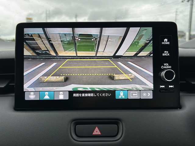 ホンダ ヴェゼル ハイブリッド e:HEV Z 岐阜県 2025(令7)年 0.1千km プラチナホワイトパール 登録時走行距離3km/純正９型ナビ/バックカメラ/パドルシフト/Ｈｏｎｄａ　ＳＥＮＳＩＮＧ/ブラインドスポットインフォメーション/ステアリングヒーター/クルーズコントロール/ワンオーナー/電動リアゲート/Bluetooth/AppleCarPlay/AndroidAuto/USB入力端子/ハーフレザーシート/スマートキー/プッシュスタート/スペアキー/LEDヘッドライト/オートライト/純正アルミホイール/レーンキープアシスト/衝突被害軽減システム/ETC2/0