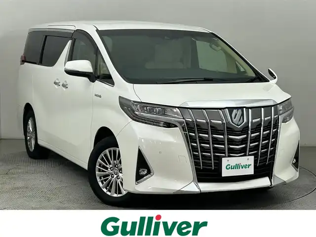 トヨタ アルファードハイブリット G Fパッケージ 道央・札幌 2020(令2)年 4.6万km ホワイトパールクリスタルシャイン ・4WD/・トヨタセーフティセンス/・プリクラッシュセーフティ/・レーンキープアシスト/・レーダークルーズコントロール/・オートハイビーム/・ブラインドスポットモニター/・標識認識システム/・純正ディスプレイオーディオ/・ナビ機能/フルセグ/BT/CD/DVD/・両側パワースライドドア/・パワーバックドア/・シートヒーター&クーラー/・ベージュレザーシート/・パワーシート/・シートメモリ/・ビルトインETC/・ドアロック連動ミラー/・LEDヘッドライト