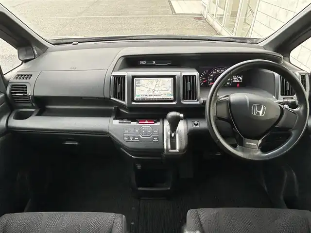 ホンダ ステップワゴン スパーダ Z 富山県 2009(平21)年 7.7万km ポリッシュドメタルメタリック 社外ナビ/ワンセグTV/バックカメラ/両側パワースライドドア/スマートキー/革巻きステアリング/HIDヘッドライト/オートライト/ウインカーミラー/フォグランプ/横滑り防止装置/パドルシフト/ETC
