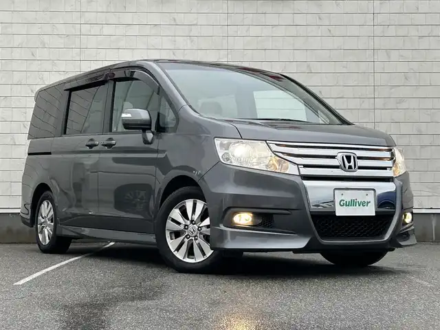 ホンダ ステップワゴン スパーダ Z 富山県 2009(平21)年 7.7万km ポリッシュドメタルメタリック 社外ナビ/ワンセグTV/バックカメラ/両側パワースライドドア/スマートキー/革巻きステアリング/HIDヘッドライト/オートライト/ウインカーミラー/フォグランプ/横滑り防止装置/パドルシフト/ETC