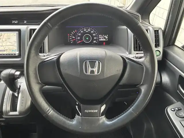 ホンダ ステップワゴン スパーダ Z 富山県 2009(平21)年 7.7万km ポリッシュドメタルメタリック 社外ナビ/ワンセグTV/バックカメラ/両側パワースライドドア/スマートキー/革巻きステアリング/HIDヘッドライト/オートライト/ウインカーミラー/フォグランプ/横滑り防止装置/パドルシフト/ETC
