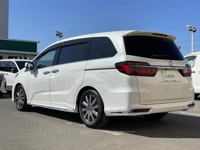 ホンダ オデッセイ ハイブリッド e:HEVアブソルート 東京都 2021(令3)年 4.4万km プラチナホワイトパール 純正１０型ナビ　/全周囲カメラ　/両側電動ドア　/追従クルコン　/前後ドラレコ　/ビルトイン２．０ＥＴＣ　/フルセグＴＶ　/ＨＤＭＩ　/Ｂｌｕｅｔｏｏｔｈ/ハーフレザー　/ＬＥＤヘッド　/パワーシート　/禁煙車
