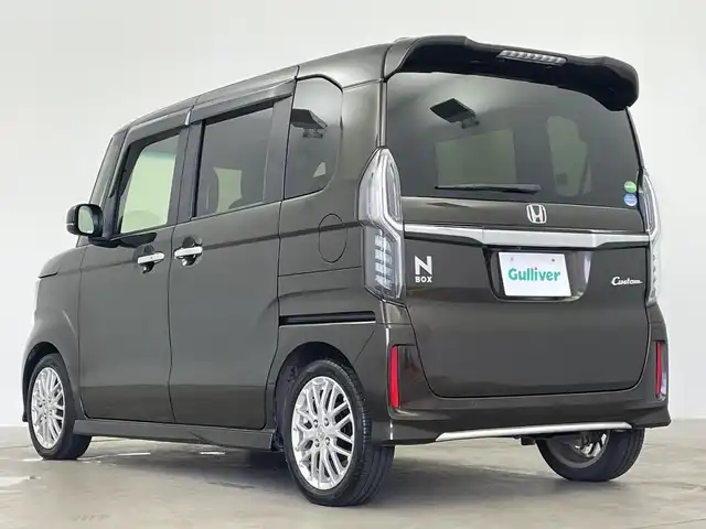 ホンダ Ｎ ＢＯＸ カスタム L ターボ 鹿児島県 2020(令2)年 4.3万km プレミアムグラマラスブロンズP 純正8インチナビ/（AM/FM/CD/DVD/Bluetooth/フルセグ）/バックカメラ/両側パワースライドドア/ホンダセンシング/レーダークルーズコントロール/純正ドライブレコーダー/ETC/ハーフレザーシート/パドルシフト/LEDヘッドライト/フロアマット/純正AW15インチ/シートヒーター/スマートキー/スペアキー