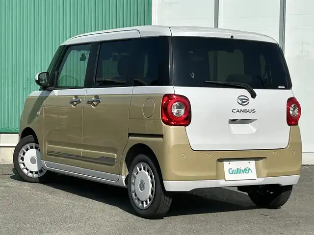 ダイハツ ムーヴ キャンバス ストライプス G 福岡県 2022(令4)年 1.4万km シャイニングホワイトパール/サンドベージュメタリック Panasonicナビ/（BT/フルセグ/DISC/AM/FM/SD/SDREC）/Bカメラ/両側パワースライドドア/LEDヘッドライト/オートライト/前席シートヒーター/ベンチシート/ホッとカップホルダー/アイドリングストップ/横滑り防止装置/コーナーセンサー/盗難防止装置/衝突被害軽減システム/ドライブレコーダー/ブレーキホールド/スマートキー/保証書/取扱説明書