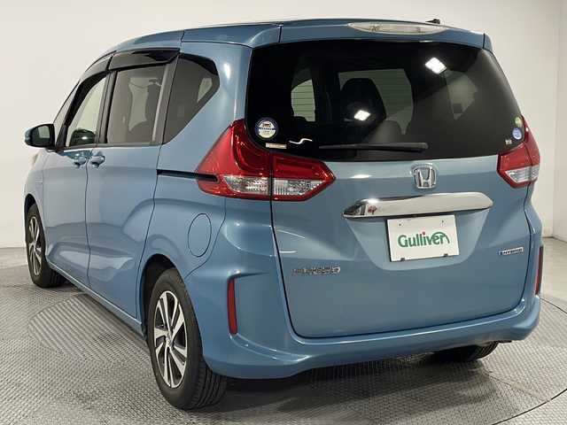 ホンダ フリード ハイブリット G ホンダセンシング 広島県 2017(平29)年 4.5万km ブルーホライゾンM 純正ナビ　/両側パワースライドドア　/バックカメラ　/レーダークルーズコントロール　/フルセグTV　/レーンキープアシスト　/衝突軽減ブレーキ　/オートライト　/ETC　/ドラレコ　/LEDヘッドランプ/スマートキー/純正15インチアルミホイール(185/65/R15)/エアバック（運転席/助手席）