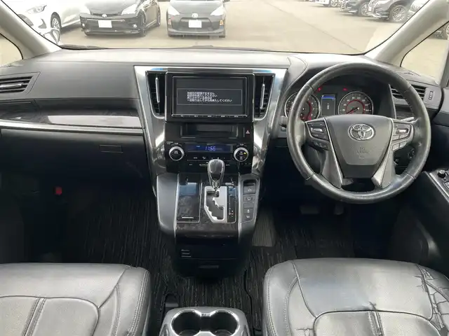 トヨタ ヴェルファイア Z Aエディション 岡山県 2018(平30)年 12.2万km ホワイトパールクリスタルシャイン 登録時走行距離121146km/純正9インチナビ/フルセグTV(AM/FM/CD/DVD/Bluetooth)/純正12.1インチフリップダウンモニター/バックカメラ/両側パワースライドドア/ビルトインETC　/デジタルインナーミラー/トヨタセーフティセンス/・プリクラッシュセーフティ/・レーダークルーズコントロール/・オートマチックハイビーム/・レーンディバーチャーアラート/オートブレーキホールド/横滑り防止装置/シートカバー/オットマン/18インチ純正AW/純正フロアマット