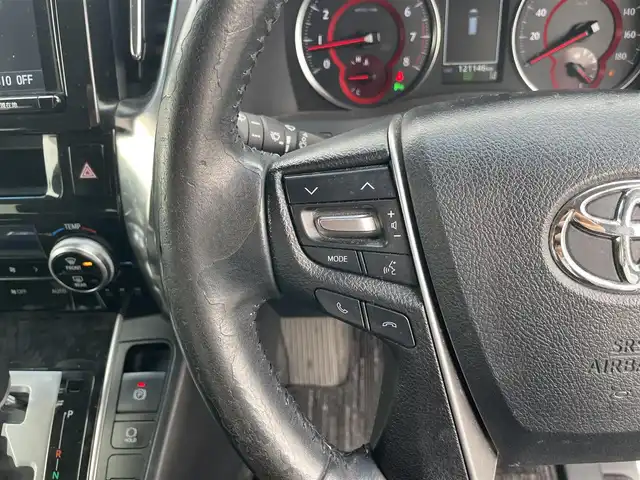 トヨタ ヴェルファイア Z Aエディション 岡山県 2018(平30)年 12.2万km ホワイトパールクリスタルシャイン 登録時走行距離121146km/純正9インチナビ/フルセグTV(AM/FM/CD/DVD/Bluetooth)/純正12.1インチフリップダウンモニター/バックカメラ/両側パワースライドドア/ビルトインETC　/デジタルインナーミラー/トヨタセーフティセンス/・プリクラッシュセーフティ/・レーダークルーズコントロール/・オートマチックハイビーム/・レーンディバーチャーアラート/オートブレーキホールド/横滑り防止装置/シートカバー/オットマン/18インチ純正AW/純正フロアマット