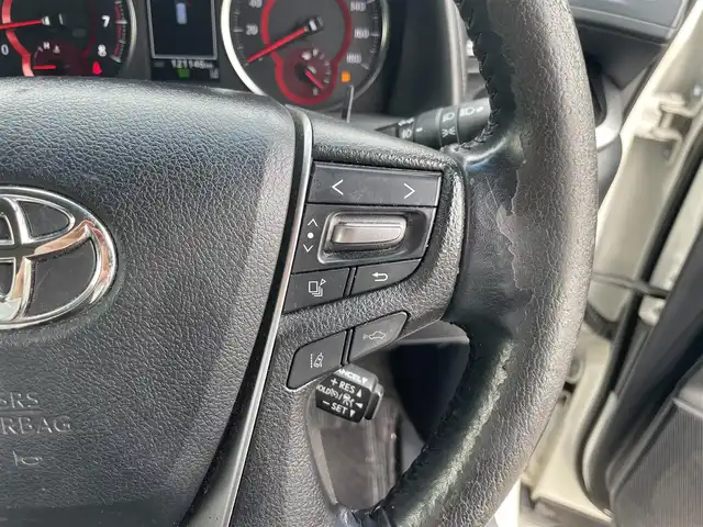 トヨタ ヴェルファイア Z Aエディション 岡山県 2018(平30)年 12.2万km ホワイトパールクリスタルシャイン 登録時走行距離121146km/純正9インチナビ/フルセグTV(AM/FM/CD/DVD/Bluetooth)/純正12.1インチフリップダウンモニター/バックカメラ/両側パワースライドドア/ビルトインETC　/デジタルインナーミラー/トヨタセーフティセンス/・プリクラッシュセーフティ/・レーダークルーズコントロール/・オートマチックハイビーム/・レーンディバーチャーアラート/オートブレーキホールド/横滑り防止装置/シートカバー/オットマン/18インチ純正AW/純正フロアマット