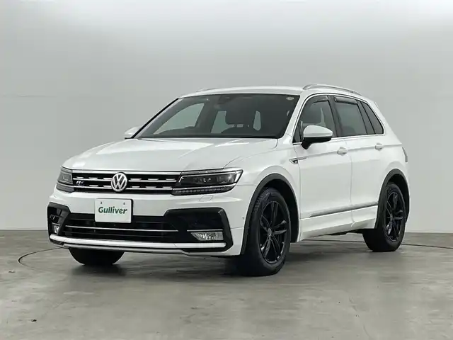 フォルクスワーゲン ティグアン TSI Rライン 福島県 2017(平29)年 17.3万km ピュアホワイト Volkswagen オールイン・セーフティ/・アダプティブクルーズコントロール（ACC）/・プリクラッシュブレーキシステム「Front Assist」/・渋滞時追従支援システム「Traffic Assist」/・レーンキープアシストシステム「Lane Assist」/・レーンチェンジアシストシステム「Side Assist Plus」/・リヤトラフィックアラート/・駐車支援システム「Park Assist」/・ドライバー疲労検知システム/・ダイナミックライトアシスト/純正8インチナビ/・フルセグ/BT/SD/CD/DVD/USB/AUX/FM/AM/・全方位カメラ/・ETC/ドライブレコーダー/革巻きステアリング/・ステアリングスイッチ/・パドルシフト/ハーフレザーシート/・全席シートヒーター/ＬＥＤヘッドライト/・フォグランプ/・リヤフォグランプ/・オートライト/電動パーキングブレーキ/・オートブレーキホールド/電動格納ミラー/・ウィンカーミラー/ルーフレール/純正フロアマット/ドアバイザー/スマートキー/・プッシュスタート
