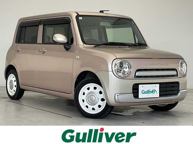 スズキ ラパン ショコラ G 愛知県 2013(平25)年 4.1万km シャンパンピンクPM SDナビ　/ワンセグ　/CD　/Bluetooth　/HIDヘッドライト　/オートライト　/アイドリングストップ　/純正フロアマット　/スマートキー　/プッシュスタート