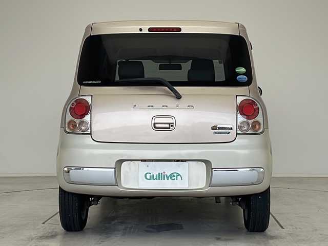 スズキ ラパン ショコラ G 愛知県 2013(平25)年 4.1万km シャンパンピンクPM SDナビ　/ワンセグ　/CD　/Bluetooth　/HIDヘッドライト　/オートライト　/アイドリングストップ　/純正フロアマット　/スマートキー　/プッシュスタート