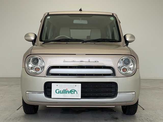 スズキ ラパン ショコラ G 愛知県 2013(平25)年 4.1万km シャンパンピンクPM SDナビ　/ワンセグ　/CD　/Bluetooth　/HIDヘッドライト　/オートライト　/アイドリングストップ　/純正フロアマット　/スマートキー　/プッシュスタート