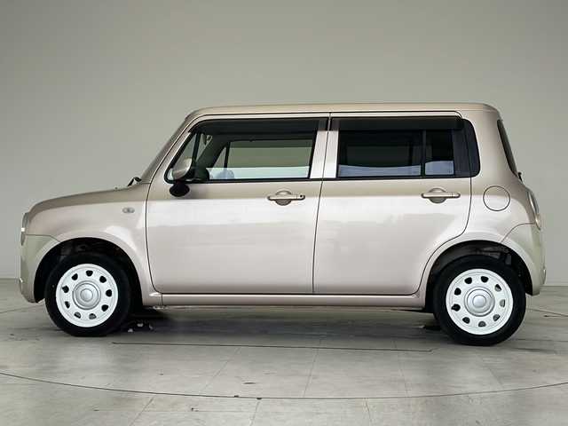 スズキ ラパン ショコラ G 愛知県 2013(平25)年 4.1万km シャンパンピンクPM SDナビ　/ワンセグ　/CD　/Bluetooth　/HIDヘッドライト　/オートライト　/アイドリングストップ　/純正フロアマット　/スマートキー　/プッシュスタート