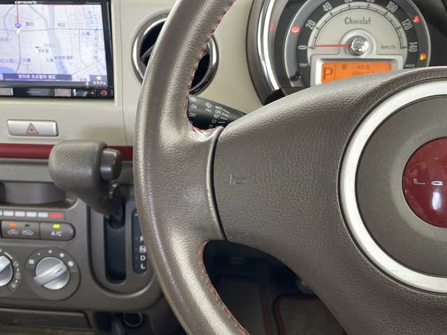 スズキ ラパン ショコラ G 愛知県 2013(平25)年 4.1万km シャンパンピンクPM SDナビ　/ワンセグ　/CD　/Bluetooth　/HIDヘッドライト　/オートライト　/アイドリングストップ　/純正フロアマット　/スマートキー　/プッシュスタート