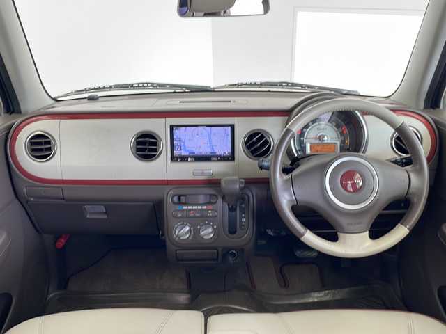 スズキ ラパン ショコラ G 愛知県 2013(平25)年 4.1万km シャンパンピンクPM SDナビ　/ワンセグ　/CD　/Bluetooth　/HIDヘッドライト　/オートライト　/アイドリングストップ　/純正フロアマット　/スマートキー　/プッシュスタート