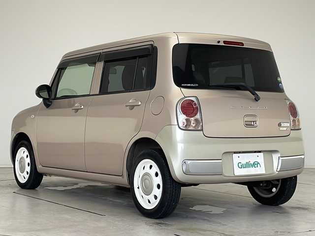スズキ ラパン ショコラ G 愛知県 2013(平25)年 4.1万km シャンパンピンクPM SDナビ　/ワンセグ　/CD　/Bluetooth　/HIDヘッドライト　/オートライト　/アイドリングストップ　/純正フロアマット　/スマートキー　/プッシュスタート