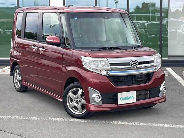 ダイハツ タント カスタム RS トップED SAⅡ 道東・釧路十勝 2015(平27)年 7.5万km ファイアークォーツレッドM ・４WD/・ターボ/・純正ナビ/（CD・DVD・TV・SD・BT・AM・FM・HDMI）/・バックカメラ/・両側パワースライドドア/・スマートキー2本/・プッシュスタート/・ハーフレザーシート/・衝突軽減システム/・アイドリングストップ/・横滑り防止装置/・ハーフレザーシート/・社外14インチアルミホイール