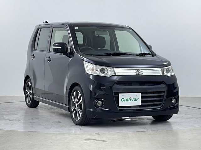 スズキ ワゴンＲ スティングレー T 道央・札幌 2013(平25)年 5.3万km ブルーイッシュブラックパール3 ・４WD / ターボ/・社外クラリオンオーディオ/・CD.USB/・パドルシフト/革巻きハンドル/・HIDライト/オートライト/・ミラーヒーター/シートヒーター/・ブッシュスタート/スマートキー/・ダウンサス
