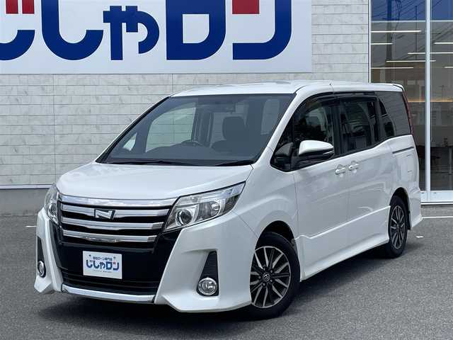トヨタ ノア Si 佐賀県 2014(平26)年 11.9万km ホワイトパールクリスタルシャイン （株）IDOMが運営する【じしゃロン佐賀店】の自社ローン専用車両になります。/こちらは現金またはオートローンご利用時の価格です。自社ローンご希望の方は別途その旨お申し付けください/・７人乗り　/・両側電動スライド　/・９インチ純正ナビ/フルセグ/ＢＴオーディオ/ＤＶＤ/ＣＤ　/・バックカメラ　/・ビルトインＥＴＣ　/・セルスタードライブレコーダー　　/・ＬＥＤライト　/・フォグランプ
