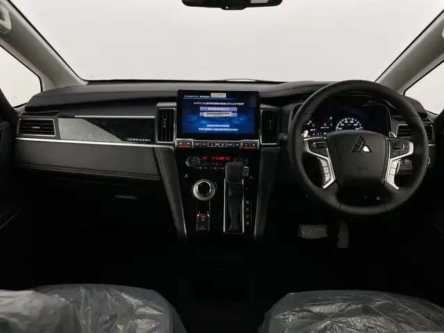 三菱 デリカＤ：５ シャモニー 新潟県 2025(令7)年 0.1千km 白 パートタイム4WD/e-Assist/ALPINE12.8型フリップダウンモニター/D:5専用11型ナビ/　CD/DVD/Bluetooth/フルセグTV/全周囲カメラ/両側パワースライドドア/パワーバックドア/レーダークルーズコントロール/LEDオートライト/ハーフレザーシート/シートヒーター/パワーシート/純正18インチアルミホイール/パドルシフト/レーンキープアシスト/ステアリングヒーター/ステアリングリモコン/スマートキー