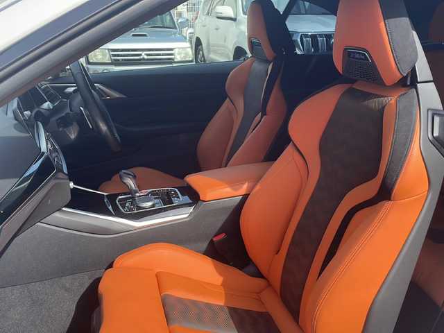 ＢＭＷ ＢＭＷ Ｍ４ カブリオレ コンペティション M xDrive 福岡県 2023(令5)年 1.6万km アルピンホワイトⅢ 禁煙車/新車ワンオーナー/純正10.25インチワイドナビディスプレイ/純正OPツートーンエクステンドメリノ革シート/純正OP5本ツインスポークアルミ/純正OPパーキングアシストプラス/harmankardonサウンドシステム/ドライビングアシストプロフェッショナル/　・高速渋滞ハンズオフアシスト・トラフィックサインアシスト/　・アクティブクルーズコントロール/　・ステアリング/レーンコントロールアシスト/　・レーンディパーチャーウォーニング　・レーンキーピングアシスト/　・クロストラフィックウォーニング・前車接近警告機能/　・後車衝突警告機能・衝突回避被害軽減ブレーキ/　・アクティブサイドコリジョン・エマージェンシーストップアシスト/Mコンパウンドブレーキシステム赤ブレーキキャリパー/フルセグTV走行中視聴可/Bluetooth/ストレージコンパートメントパッケージ/　・12V電源ソケット・USBタイプCソケット/　・シートバック収納・収納ネット・荷物固定用フック/デジタルメータディスプレイ/ヘッドアップディスプレイ/メモリーパワーシート/シートヒーター/保証書/取説/カードキー/スマートキー×２