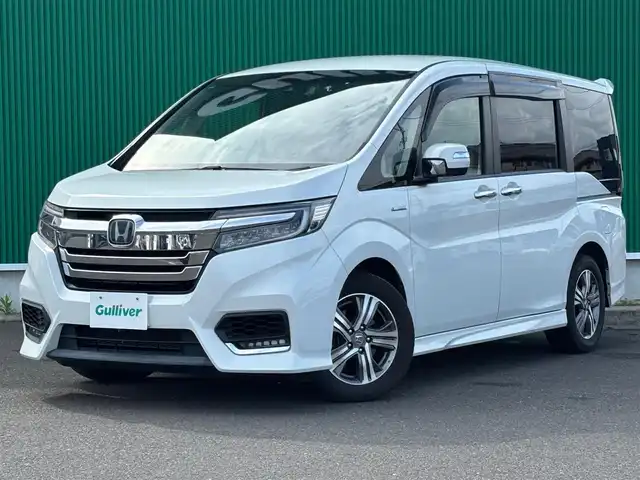 ホンダ ステップワゴン スパーダ ハイブリッド G EX ホンダセンシング 宮城県 2018(平30)年 7.9万km プラチナホワイトパール ホンダセンシング/●衝突軽減ブレーキ〈CMBS〉/●誤発進抑制機能/●歩行者事故低減ステアリング/●路外逸脱抑制機能/●渋滞追従機能付ACC〈アダプティブ・クルーズ・コントロール〉/●LKAS〈車線維持支援システム〉/●先行車発進お知らせ機能/●標識認識機能/純正11.6インチフリップダウンモニター（VM-185EN）/純正9インチナビ（VXM-187VFNi）/・CD/DVD/・Bluetooth/・フルセグTV/バックカメラ/ビルトインETC/ドライブレコーダー/両側パワースライドドア/ハーフレザーシート/シートヒーター/革巻きステアリング/ステアリングスイッチ/電動パーキングブレーキ/ブレーキホールド/LEDヘッドランプ/フォグランプ/オートライト/スマートキー＆プッシュスタート/トリプルゾーンコントロール・フルオートエアコンディショナー/電動格納ミラー/純正16インチAW/純正フロアマット/ドアバイザー/W/サイド/カーテンエアバッグ