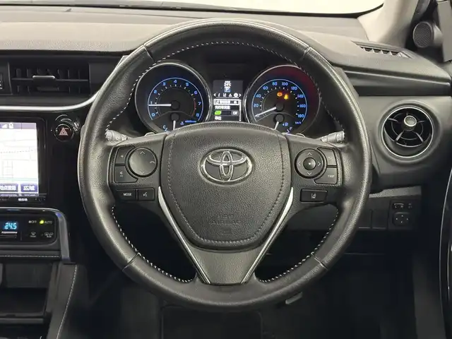 トヨタ オーリス 180G 三重県 2015(平27)年 5.6万km ホワイトパールクリスタルシャイン 1.8L ガソリン/FF/MTモード付フロアCVT（7速スポーツシーケンシャルシフトマチック）/純正 9インチナビ NSZT-Y64T/（AM/FM/CD/DVD/SD/SDREC/Bluetooth/TV）/バックガイドモニター/ドライブレコーダー 前方/ビルトイン ETC/Toyota Safety Sense/●プリクラッシュセーフティ［PCS］/●レーンディパーチャーアラート［LDA］/●オートマチックハイビーム［AHB］/●VSC&TRC（横滑り防止制御）/・【OP】SRS エアバッグ（運転席・助手席・サイド・カーテンシールド）/・ABS/など/装備/●ハーフレザーシート/●左右独立温度独立調整オートエアコン/●オートライト/●フロントフォグランプ/●ヘッドライトオートレベリング機能/●ステアリングスイッチ/●パドルシフト/●LEDクリアランスランプ/●プッシュスタート/●スマートキーx2/●純正 16inAW/など
