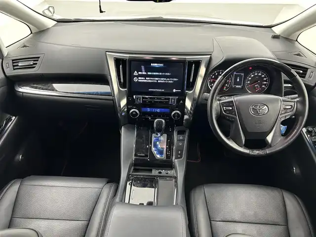 トヨタ ヴェルファイア Z Gエディション 熊本県 2019(令1)年 4.1万km ホワイトパールクリスタルシャイン 社外１１インチナビ（CD/DVD/Bluetooth/フルセグTV）/社外フリップダウンモニター/バックカメラ/ビルトインETC/レザーシート/前席シートヒーター＆ベンチレーション/前席パワーシート/電動テレスコ＆チルトステアリング/ステアリングヒーター/アドミレイションエアロ/電動パーキングブレーキ・ブレーキホールド/AC100V//トヨタセーフティセンス/・プリクラッシュセーフティ/・レーンディパーチャーアラート/・ロードサインアシスト/・レーダークルーズコントロール/・アダプティブハイビーム/・パーキングサポートブレーキ/純正アルミホイール