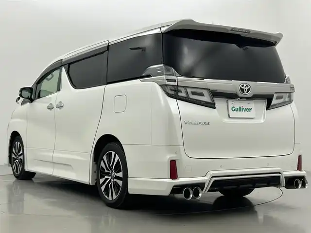 トヨタ ヴェルファイア Z Gエディション 熊本県 2019(令1)年 4.1万km ホワイトパールクリスタルシャイン 社外１１インチナビ（CD/DVD/Bluetooth/フルセグTV）/社外フリップダウンモニター/バックカメラ/ビルトインETC/レザーシート/前席シートヒーター＆ベンチレーション/前席パワーシート/電動テレスコ＆チルトステアリング/ステアリングヒーター/アドミレイションエアロ/電動パーキングブレーキ・ブレーキホールド/AC100V//トヨタセーフティセンス/・プリクラッシュセーフティ/・レーンディパーチャーアラート/・ロードサインアシスト/・レーダークルーズコントロール/・アダプティブハイビーム/・パーキングサポートブレーキ/純正アルミホイール