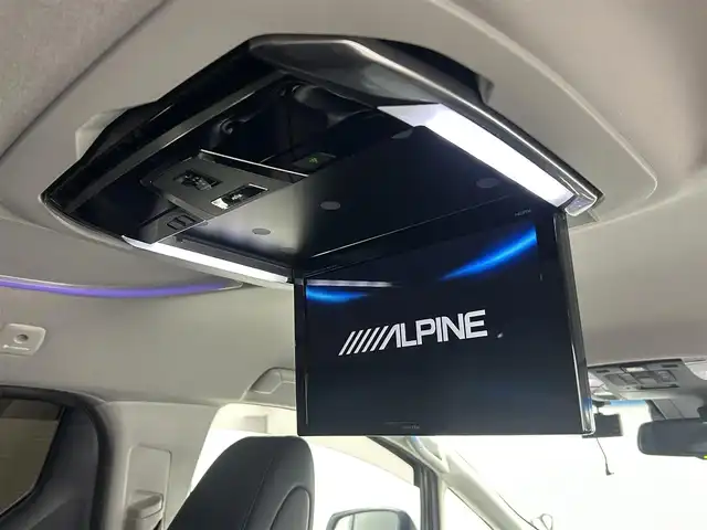 トヨタ ヴェルファイア Z Gエディション 熊本県 2019(令1)年 4.1万km ホワイトパールクリスタルシャイン 社外１１インチナビ（CD/DVD/Bluetooth/フルセグTV）/社外フリップダウンモニター/バックカメラ/ビルトインETC/レザーシート/前席シートヒーター＆ベンチレーション/前席パワーシート/電動テレスコ＆チルトステアリング/ステアリングヒーター/アドミレイションエアロ/電動パーキングブレーキ・ブレーキホールド/AC100V//トヨタセーフティセンス/・プリクラッシュセーフティ/・レーンディパーチャーアラート/・ロードサインアシスト/・レーダークルーズコントロール/・アダプティブハイビーム/・パーキングサポートブレーキ/純正アルミホイール